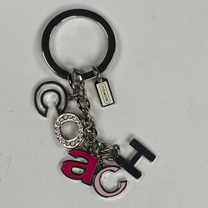 Coach Pink and Silver Letter Keychain. Bag charm. Silver tone, pinks, crystals
